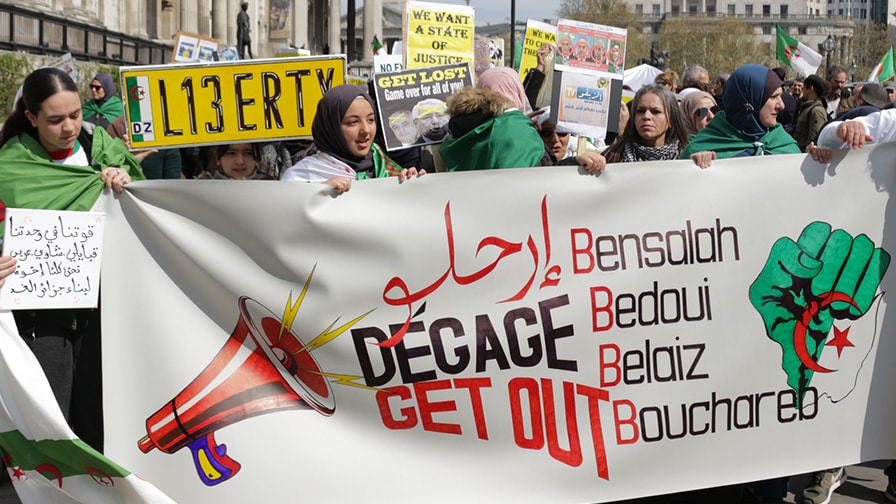 Protesters calling for the remaining members of the Algerian regime to step down.